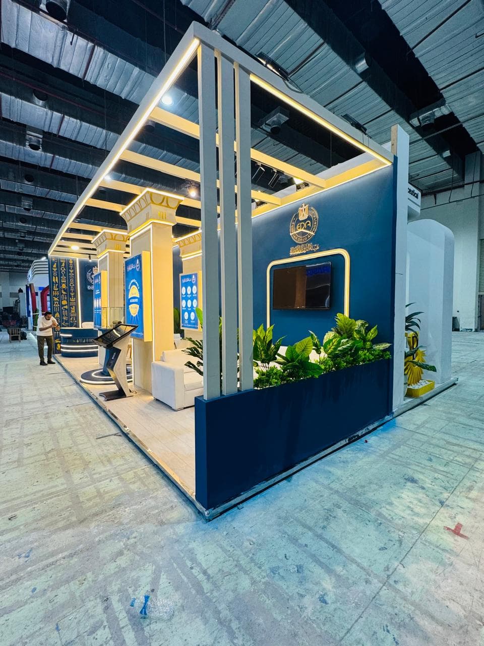 Navy-and-gold pavilion, full elevation, Equal's stand for Egyptian Drug Authority