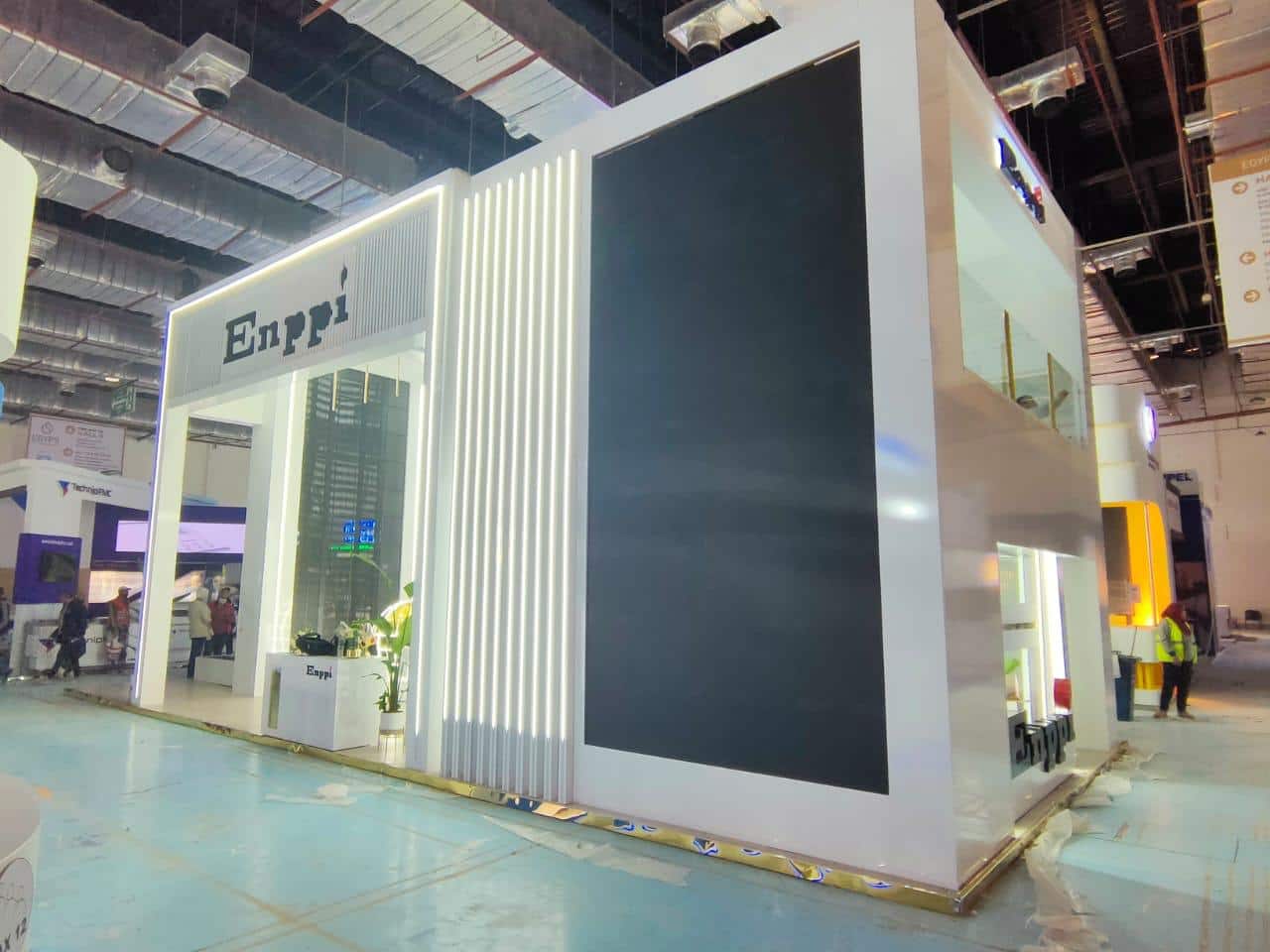 White vertical-fin façade, full elevation, Equal's stand for Enppi
